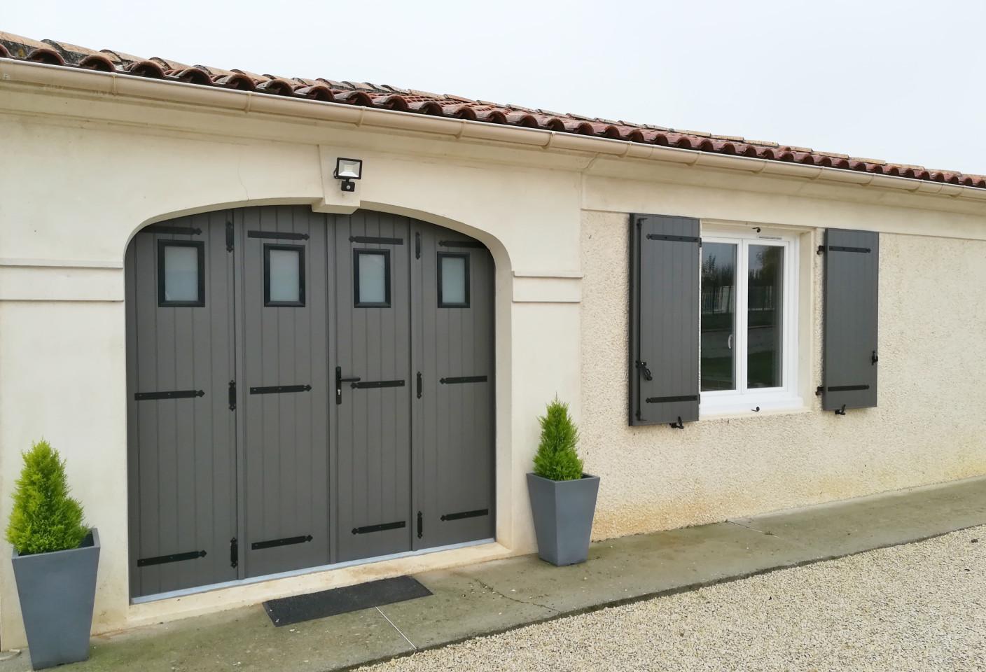 Porte de garage repliable