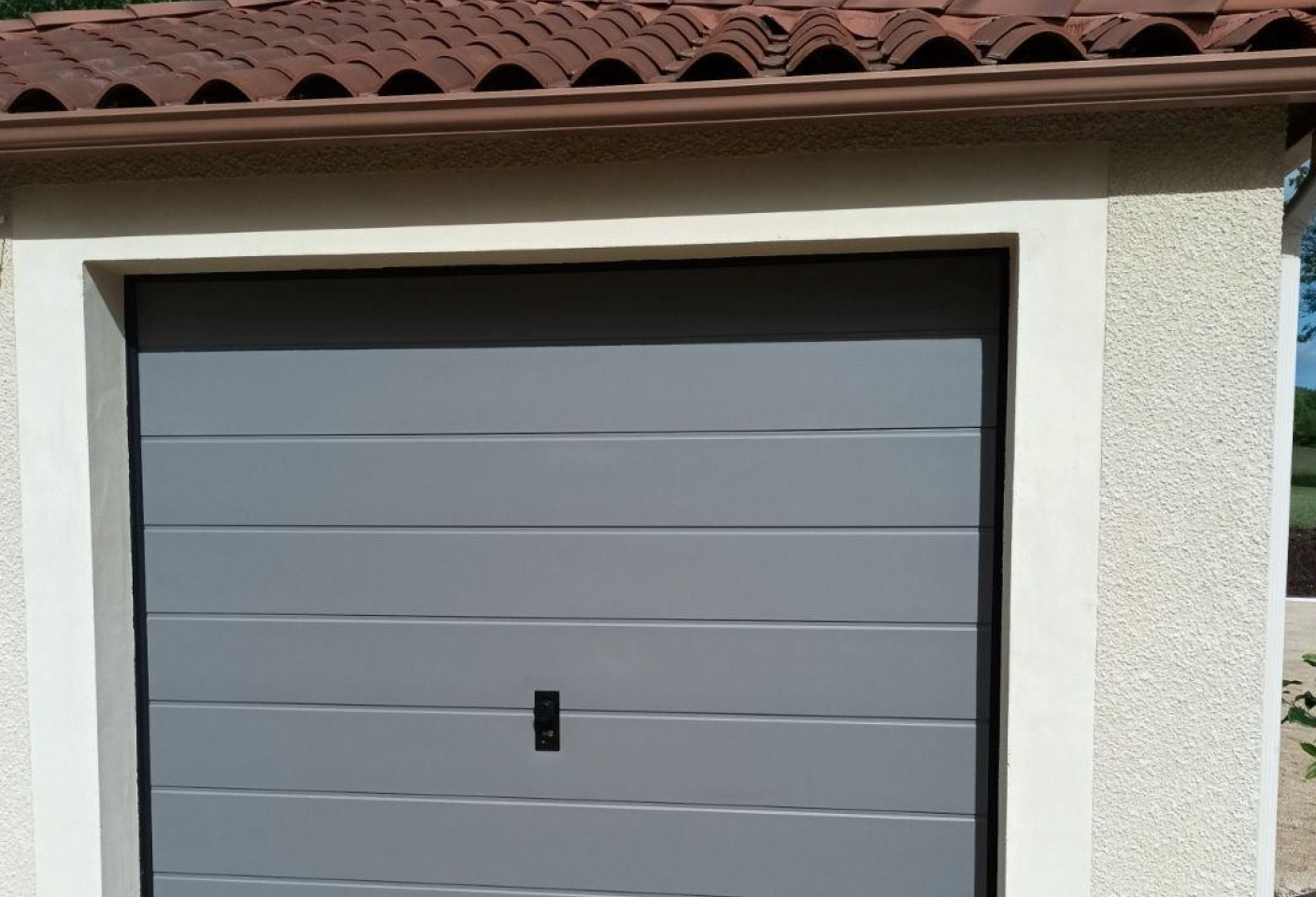 Porte de garage sectionnelle plafond