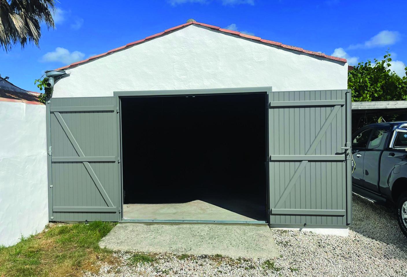Porte de garage battante aluminium