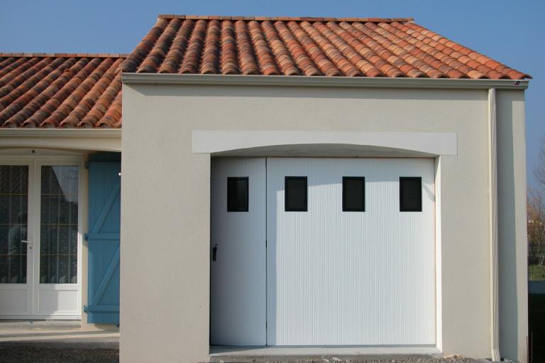 Porte de garage coulissante PVC