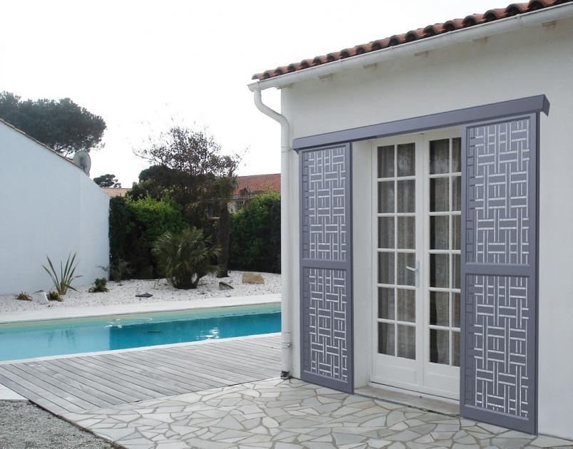 Volets coulissants tôle découpée laser